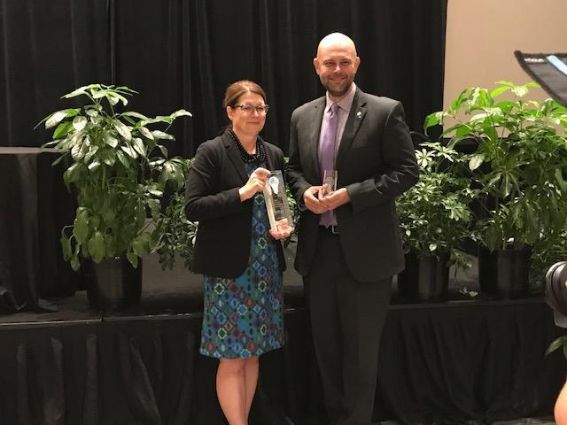 Lara and josh accept award