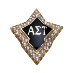Alpha Sigma Tau pin - Gold Alpha Sigma Tau sorority pin in a diamond shape. Greek letters ΑΣΤ appear in white on a black enamel center. A border of small pearls surrounds the center design. The pin is shown against a white background.