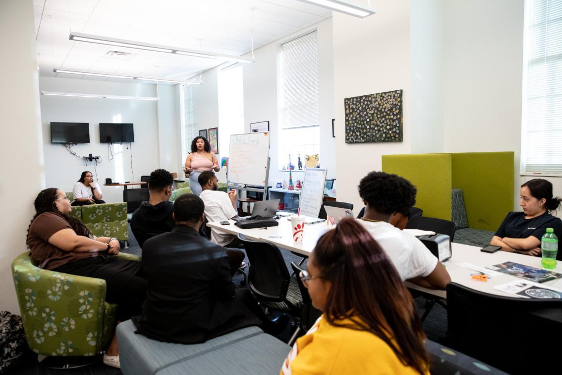 Student meeting in the Cookie Scott Lounge