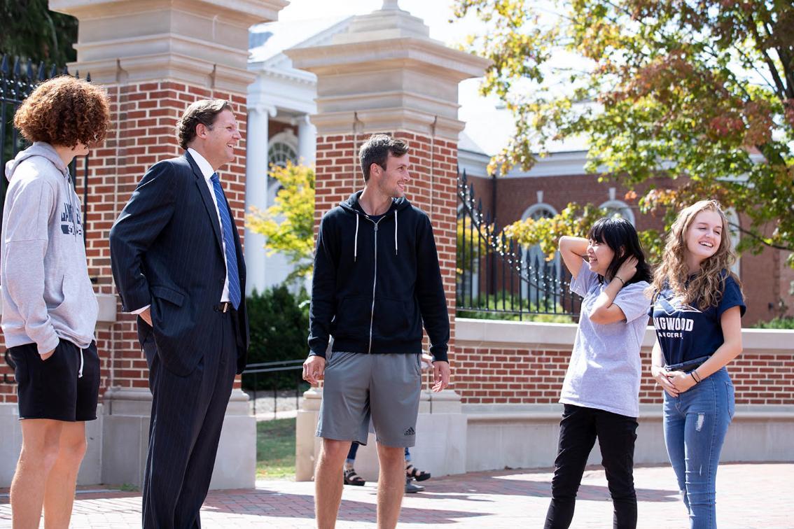 President Reveley talking with students on campus