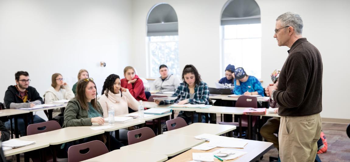 Dr. McRae Amoss in the classroom with students