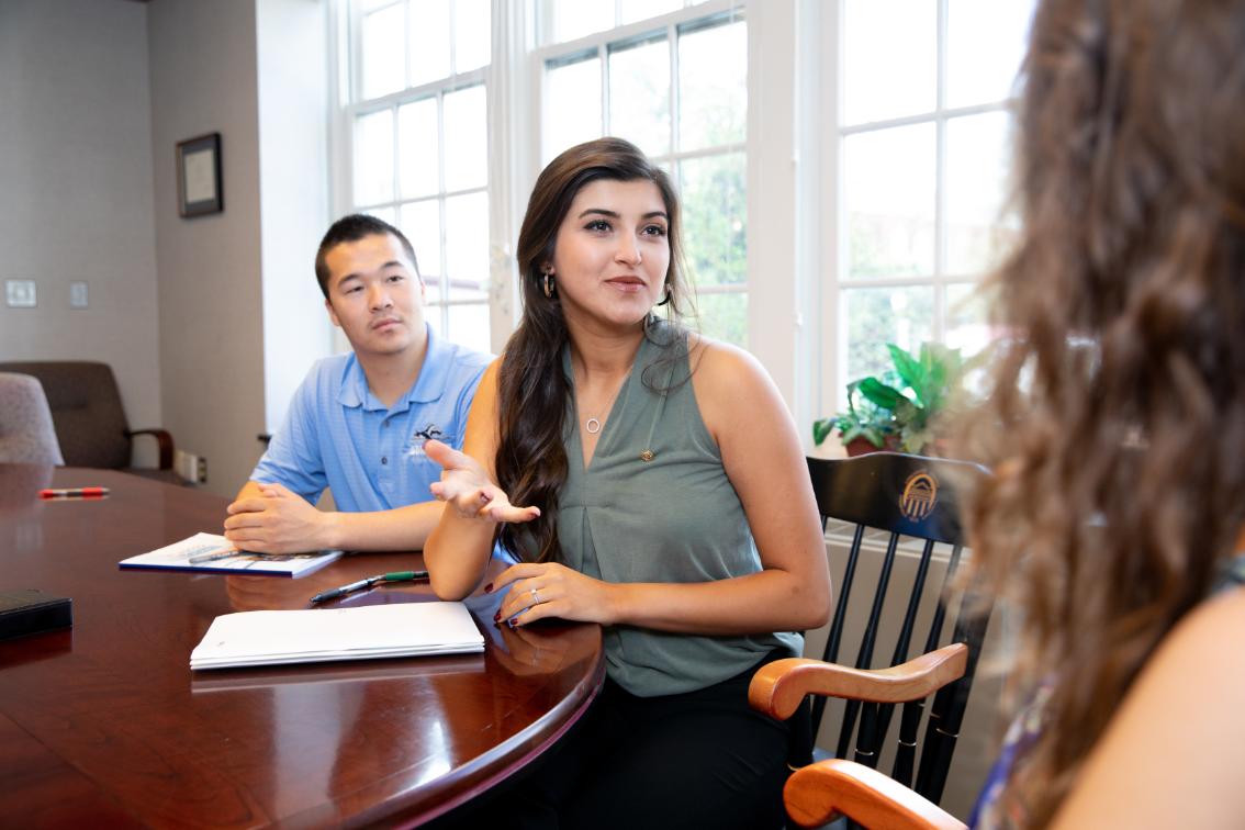 Students in a business meeting