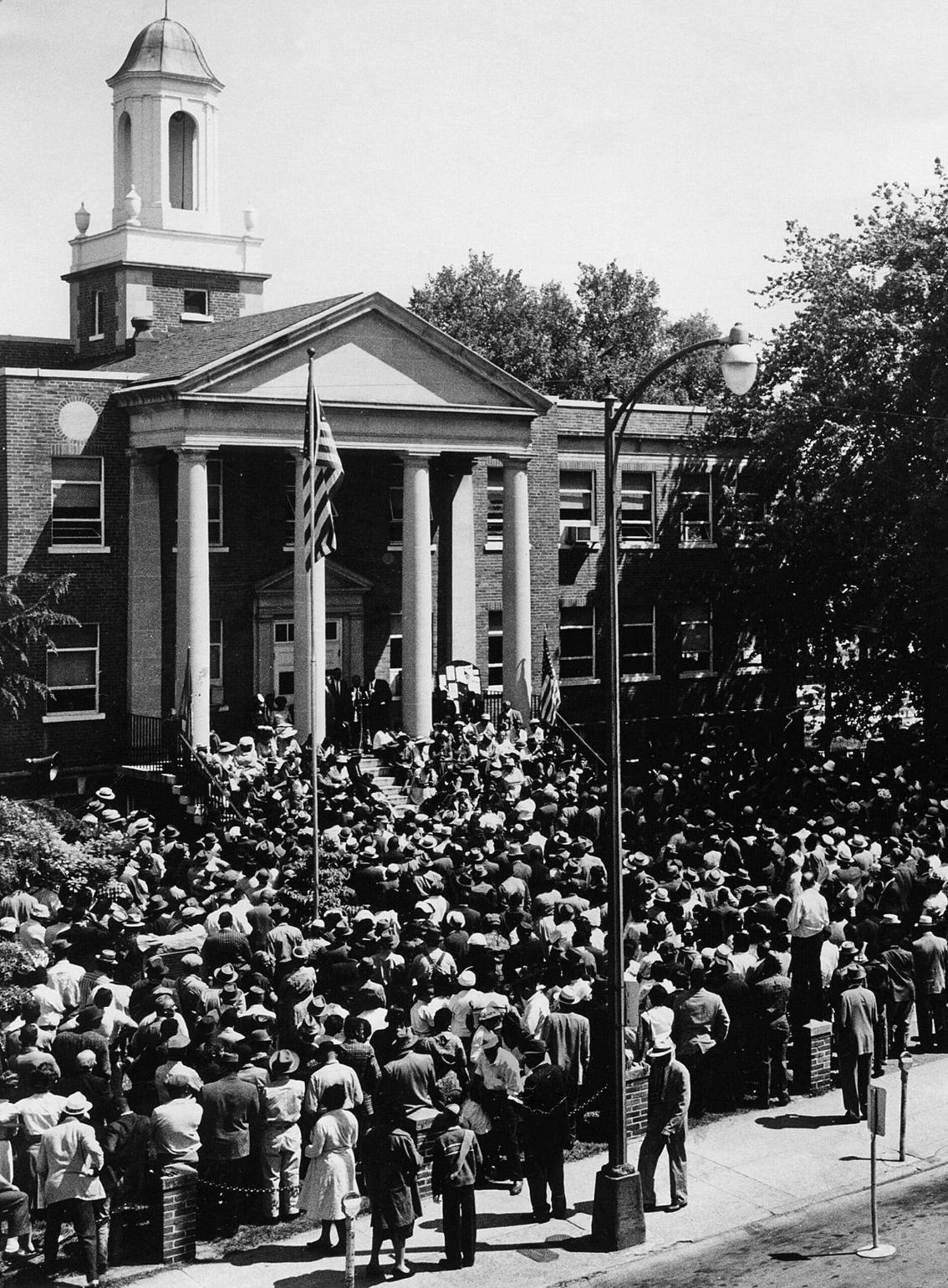 Martha Bailey Brown ’27 was touring an exhibit at the Robert Russa Moton Museum, and there it was: a mural photograph of the 1961 rally and the heroes who spoke that day. There, on the podium, is Rev. Griffin. There are Hill and Wilkins. And there, to the left, is Martha.