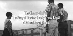 Title Screen from the video The Choice of a Few: The Story of Davis v. County School Board of Prince Edward County showing three students standing out side the Moton High School