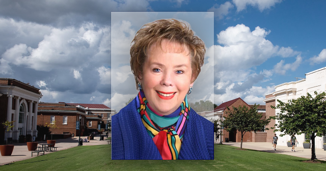 Dr. Janet Greenwood with a view of Brock Commons in the background